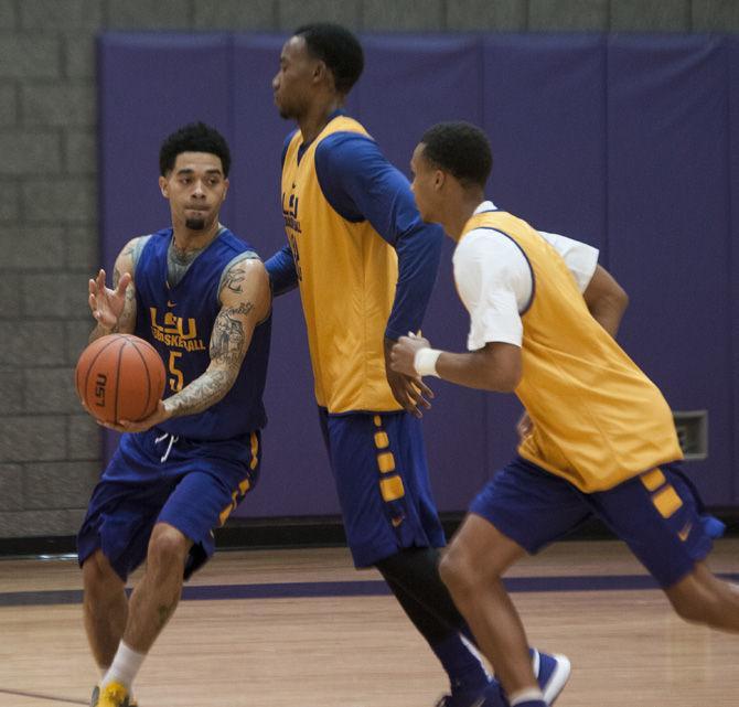 LSU senior guard Josh Gray (5) handles the ball during a practice drill on Monday, Oct. 5, 2015, at the LSU Basketball Practice Facility.