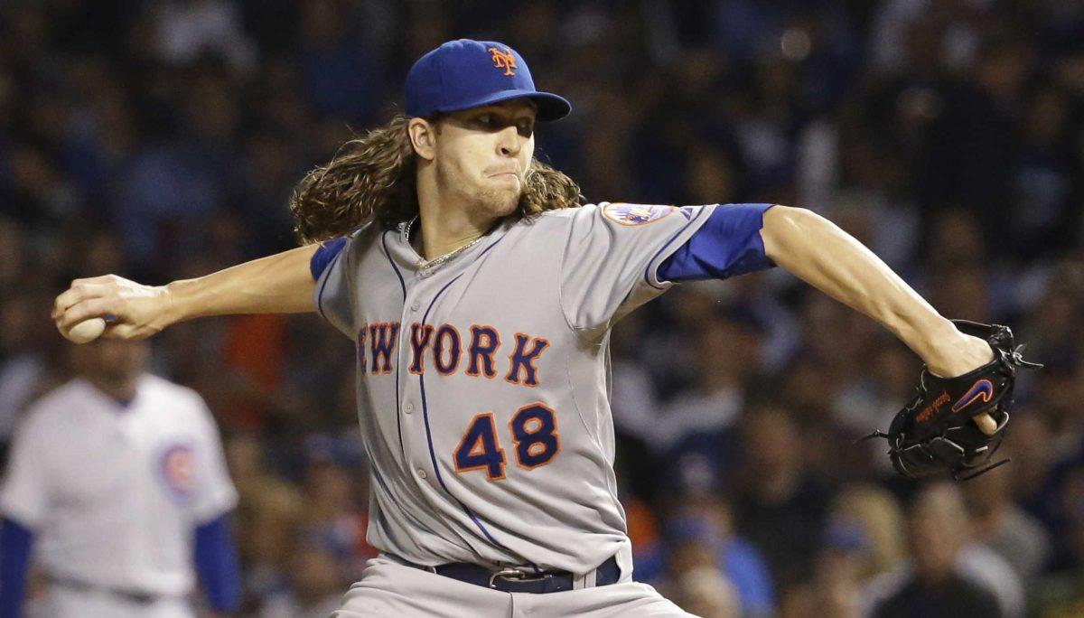 New York Mets pitcher Jacob deGrom throws during the first inning of Game 3 of the National League baseball championship series against the Chicago Cubs Tuesday, Oct. 20, 2015, in Chicago. (AP Photo/Nam Huh)