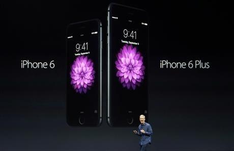 Apple CEO Tim Cook introduces the new iPhone 6 and iPhone 6 Plus on Tuesday, Sept. 9, 2014, in Cupertino, Calif.&#160;