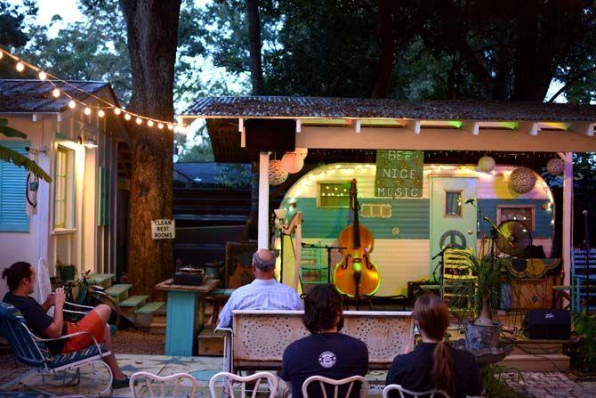 Locals await live music in Penni Guidry and David Mooney's backyard concert lot, "Bee Nice," Friday, Oct. 16, 2015.