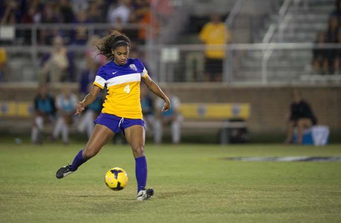 LSU junior forward Summer Clarke (4) goes to clear the ball downfield during the LSU vs Vanderbilt University game on Friday Oct. 2, 2015, at the LSU Soccer Stadium.