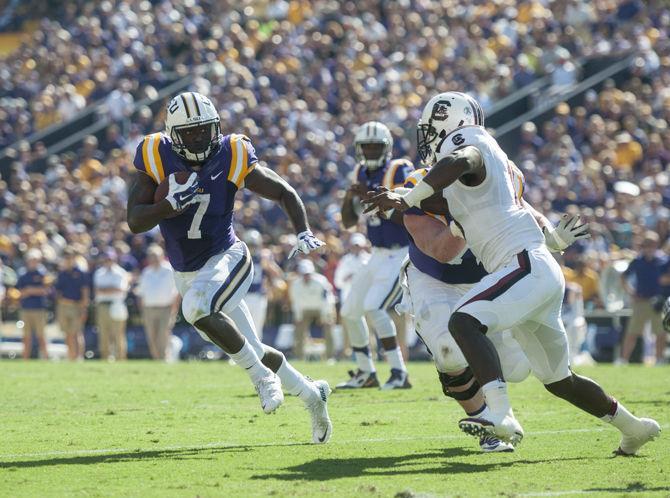 LSU sophomore running back Leonard Fournette (7) carries the ball during the Tigers&#8217; 45-24 victory against the University of South Carolina on Saturday, Oct. 10, 2015 in Tiger Stadium.