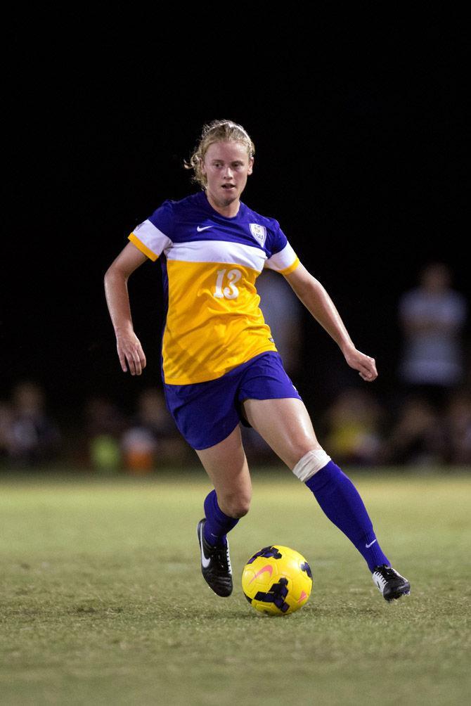 LSU junior Megan Lee (13) works the ball up the field Friday, Sept. 5, 2015, during the Tigers' 1-1 tie against Ball State at LSU Soccer Stadium.