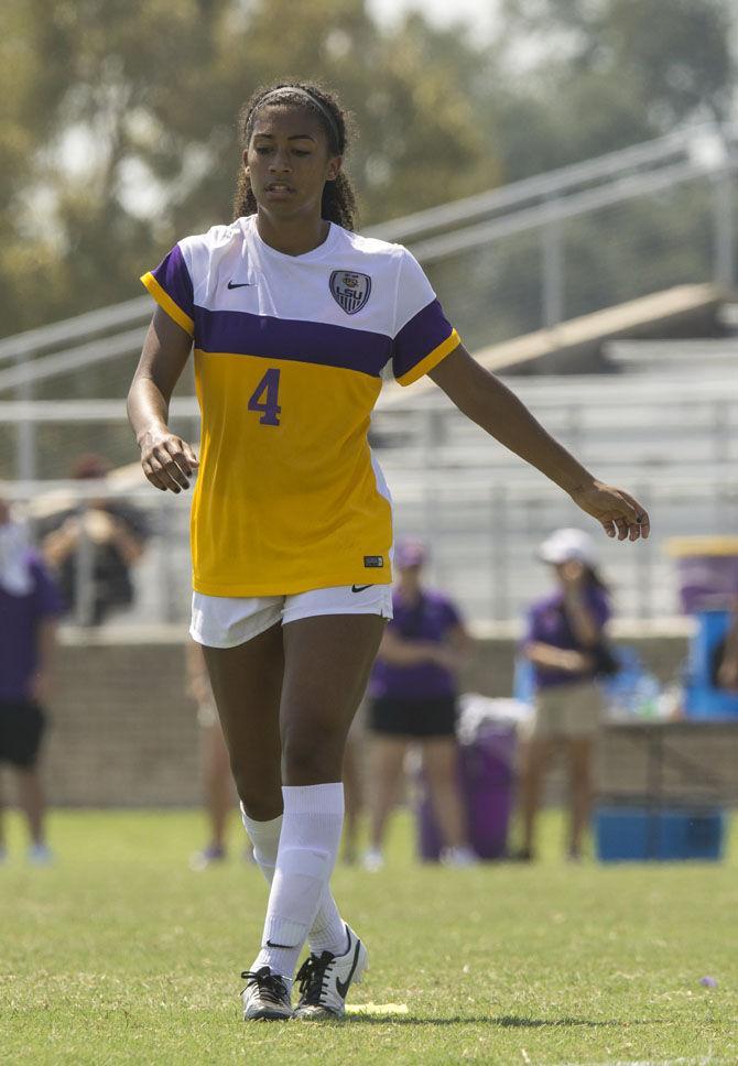 LSU junior forward Summer Clarke (4) walks back to her respective position on Sunday, Sept. 20, 2015 during the Tigers&#8217; 5-1 win against Marquette University at LSU Soccer Stadium.