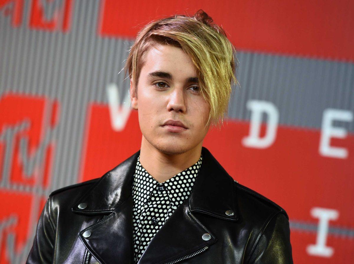 FILE - In this Aug. 30, 2015 file photo, Justin Bieber arrives at the MTV Video Music Awards in Los Angeles. The 2nd District Court of Appeal in Los Angeles ruled Wednesday, Sept. 30, 2015, that&#160;a 2010 law enacted to curb reckless driving by the paparazzi does not violate the First Amendment and a case against a photographer charged with recklessly chasing Bieber on a Los Angeles freeway in 2012 should be reinstated. (Photo by Jordan Strauss/Invision/AP, File)