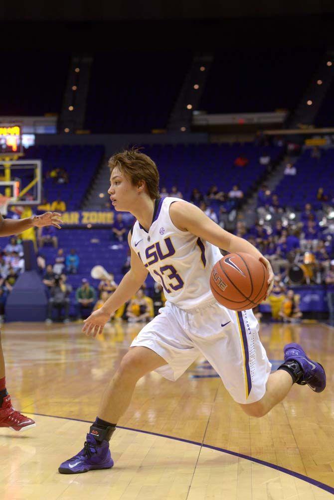 LSU sophomore guard, Rina Hill (13), dribbles the ball during the Tigers' 51-39 victory against Alabama on Sunday, Feb. 8, 2015, in the Pete Maravich Assembly Center.