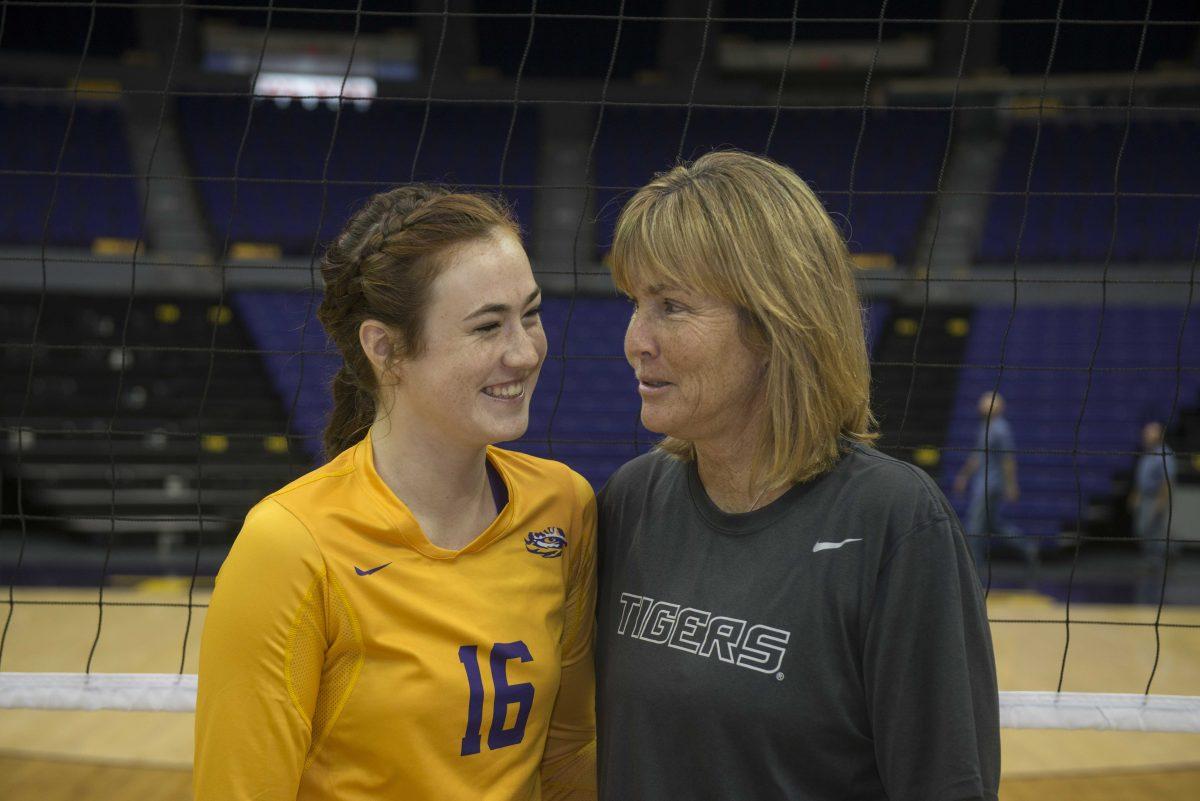 LSU volleyball coach Fran Flory and freshman setter Lindsay Flory (16) get ready before practice on Wednesday, Sept. 02, 2015 at the Pete Maravich Assembly center