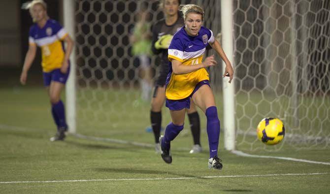 LSU senior midfielder Alex Arlitt (14) clears the ball away from the Tiger&#8217;s goal during the LSU vs Vanderbilt University soccer game on Friday Oct. 2, 2015, at the LSU Soccer Stadium.