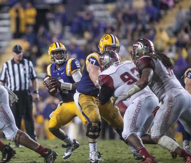 LSU sophomore quarterback Brandon Harris (6) snaps the ball during the Tigers&#8217; 48- 20 victory against Western Kentucky on Saturday, Oct. 24, 2015 in Tiger Stadium.