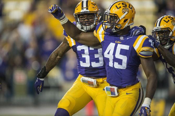 LSU sophomore safety Jamal Adams (33) celebrates senior linebacker Deion Jones (45) interception during the Tigers&#8217; 44-22 victory against Eastern Michigan on Saturday, Oct. 03, 2015 in Tiger Stadium.