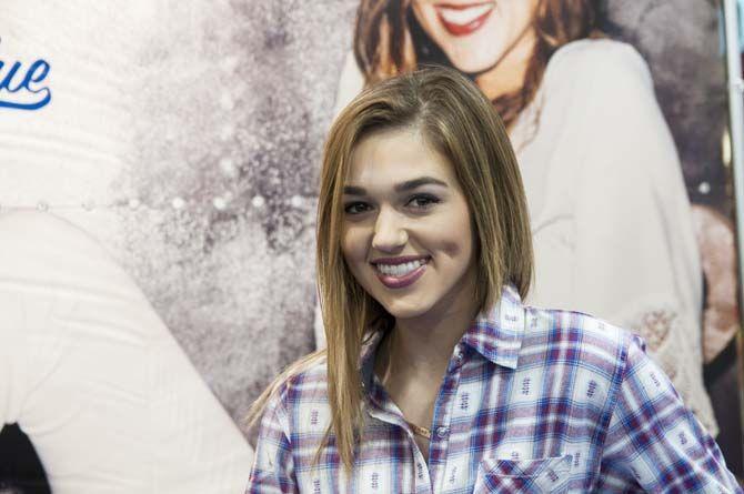 Sadie Robertson sits down at the booth moment before fans are let into the store on Saturday Nov. 21, 2015, in Rue 21 at the Mall of Louisiana in Baton Rouge.