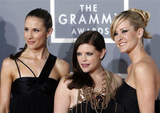 FILE - In this Feb. 11, 2007, file photo, the Dixie Chicks, Emily Robison, left, Natalie Maines, center, and Martie Maguire, who earned five Grammy nominations, arrive for the 49th Annual Grammy Awards in Los Angeles. The Dixie Chicks are ready to party in the USA with a summer 2016 tour. The Grammy-winning group will kick off its &#8220;DCX MMXVI World Tour&#8221; on June 1, 2016, in Cincinnati. It wraps in Los Angeles on Oct. 10, 2016. The group will visit more than 40 cities, including New York, Chicago, San Francisco, Detroit, Dallas and Toronto. The Dixie Chicks' North American tour will follow the group's European tour that begins in April. (AP Photo/Matt Sayles, File)