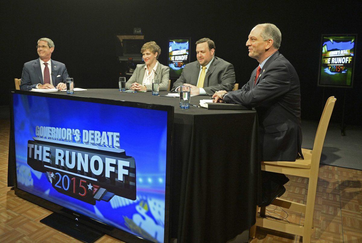 From left, gubernatorial candidate, U.S. Sen. David Vitter, R-La., moderators Kelly C. Spires and Jeremy Alford and gubernatorial candidate state Rep. John Bel Edwards, D-Baton Rouge, prepare for a debate, Tuesday, Nov. 10, 2015, at LPB Studios in Baton Rouge, La. (Hilary Sheinuk/The Advocate via AP) MAGS OUT; INTERNET OUT; NO SALES; TV OUT; NO FORNS; LOUISIANA BUSINESS INC. OUT (INCLUDING GREATER BATON ROUGE BUSINESS REPORT, 225, 10/12, INREGISTER, LBI CUSTOM); MANDATORY CREDIT