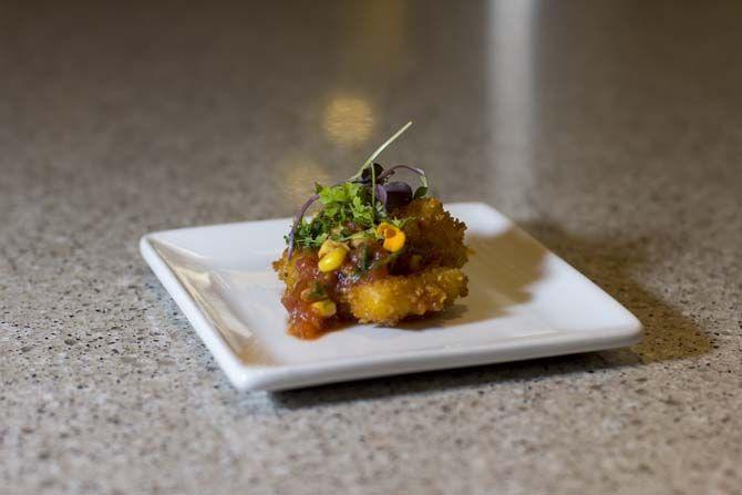 LSU Chef, Eric Mccauley, presents his dish for the LSU Chef Challenge on Wednesday, November 11, 2015, at The 5 Dining Hall.