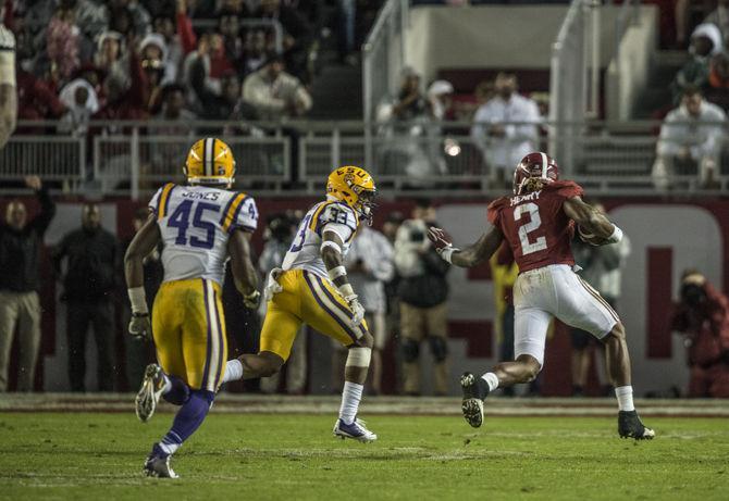 Alabama running back Derrick Henry (2) runs towards the endzone while LSU&#8217;s sophomore saftey Jamal Adams (33) attemts to catch him during the Tigers' game against the University of Alabama on Saturday, Nov. 7, 2015 in the Bryant-Denny Stadium.&#160;The Tigers trail the Crimson Tide, 13-10, at halftime.