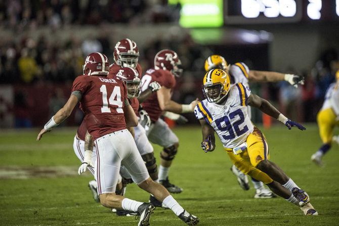 LSU junior defensive end Lewis Neal (92) runs to tackle Alabama senior quarterback Jake Coker during the Tigers' 30-16 defeat against The Crimson Tide on Saturday, Nov. 7, 2015 in the Bryant-Denny Stadium.