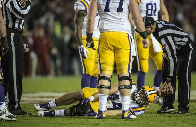 LSU sophomore fullback John David Moore (44) lays in pain during the Tigers' 30-16 defeat against The University of Alabama on Saturday, Nov. 7, 2015 in the Bryant-Denny Stadium.