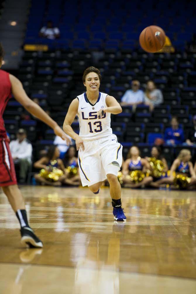 LSU junior guard Rina Hill (13) passes the ball around to her teammates in enemy territory during their 88-57 win against Union on Wednesday Nov. 4, 2015, in the LSU Pete Maravich Assembly Center.