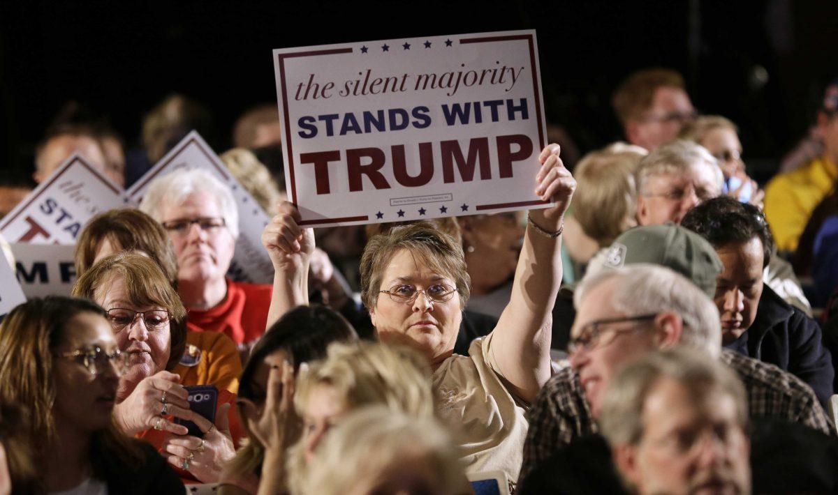 An audience member listens as Republican presidential candidate Donald Trump speaks during a rally at Iowa Central Community College, Thursday, Nov. 12, 2015, in Fort Dodge, Iowa. (AP Photo/Charlie Neibergall)