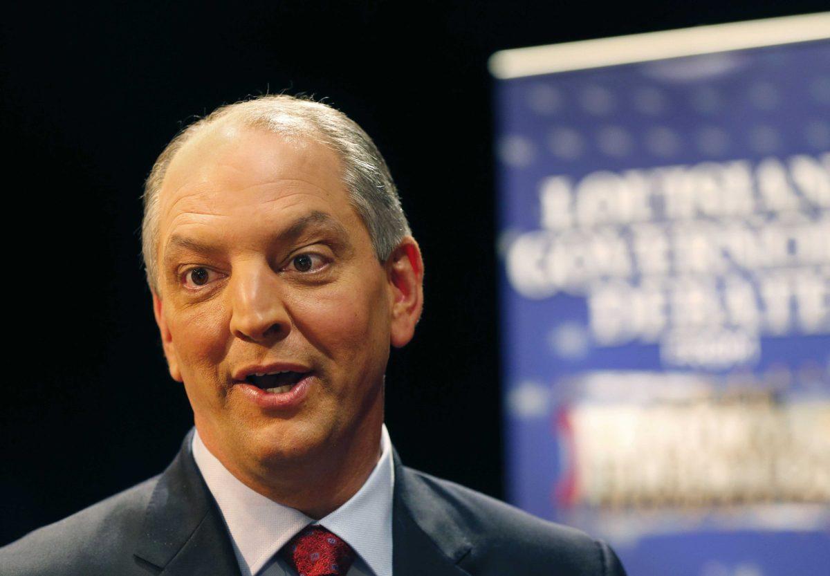 Louisiana Democratic gubernatorial candidate John Bel Edwards speaks to reporters after his debate against challenger Sen. David Vitter, R-La., in Baton Rouge, La., Monday, Nov. 16, 2015. (AP Photo/Gerald Herbert)