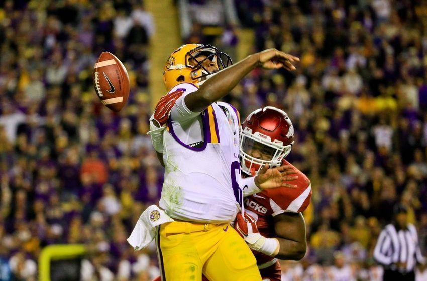 In LSU's 31-14 loss to Arkansas, Tigers quarterback Brandon Harris gets stripped by a Razorback defender. (Via Arkansas Razorbacks)