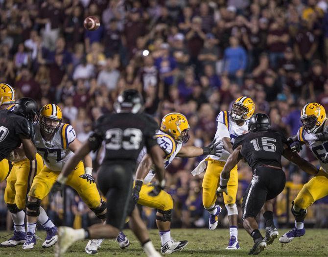 LSU sophomore quarterback Brandon Harris (6) throws the ball during the Tigers' 19-7 victory against Texas A&amp;M University on Saturday, Nov. 28, 2015 in Tiger Stadium.