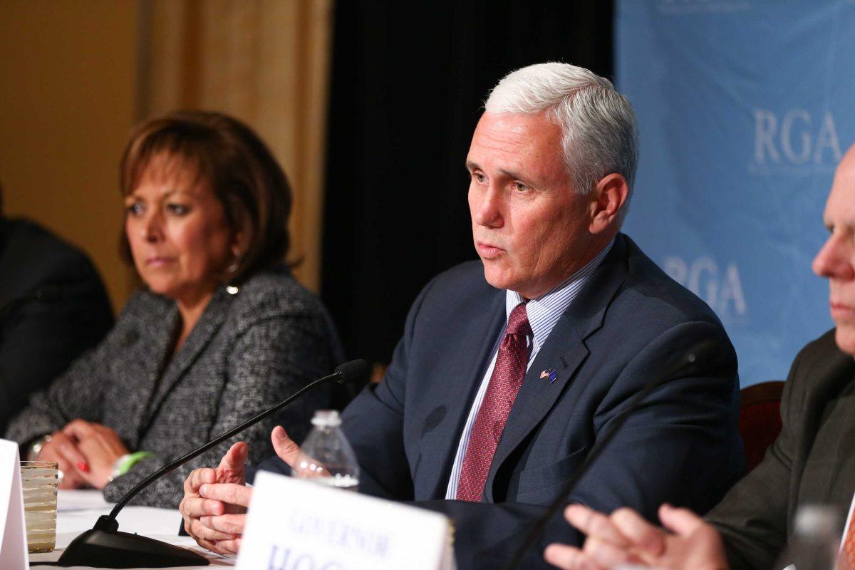 FILE - In a Wednesday, Nov. 18, 2015 file photo, Indiana Gov. Mike Pence speaks during a news conference at the Republican Governors Association annual conference, in Las Vegas. Indiana could be shaping up as a testing ground for how states deal with Syrian refugees, after Pence directed state agencies this month to suspend resettlement efforts because of security concerns. The American Civil Liberties Union in Indiana has asked a federal judge to put a temporary hold on Pence's directive, saying it violates the Constitution. (AP Photo/Chase Stevens, File)