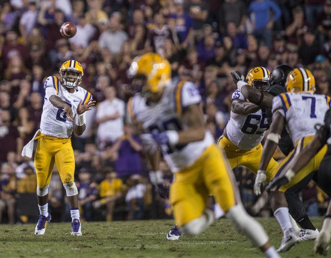 <p>LSU sophomore quarterback Brandon Harris (6) passes the ball during the Tigers' 19-7 victory against Texas A&M University on Saturday, Nov. 28, 2015 in Tiger Stadium.</p>