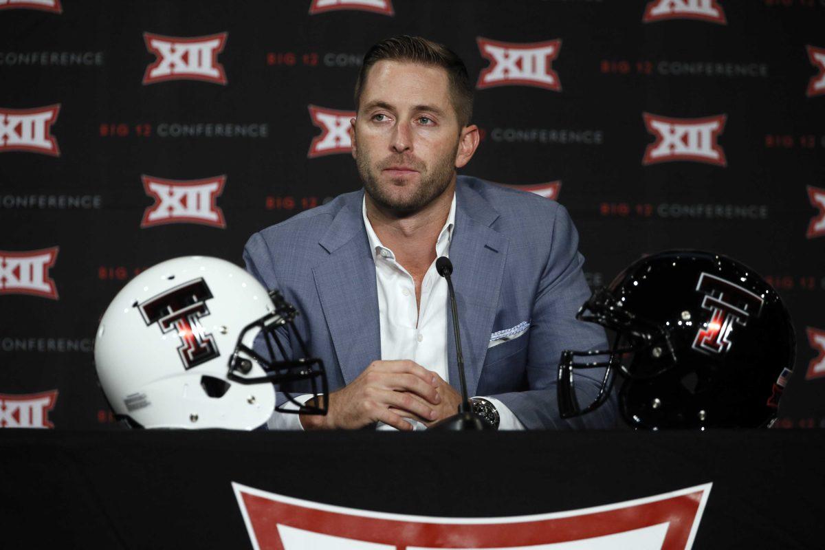 FILE - In this July 20, 2015, file photo, Texas Tech head football coach Kliff Kingsbury addresses attendees at Big 12 Conference Football Media Days, in Dallas. Texas Tech coach Kingsbury has indefinitely suspended his second-best receiver and will lose three defensive players to transfers. A release from the athletic department says Devin Lauderdale's suspension is for a "failure to uphold" school expectations for its athletes.(AP Photo/Tony Gutierrez, File)