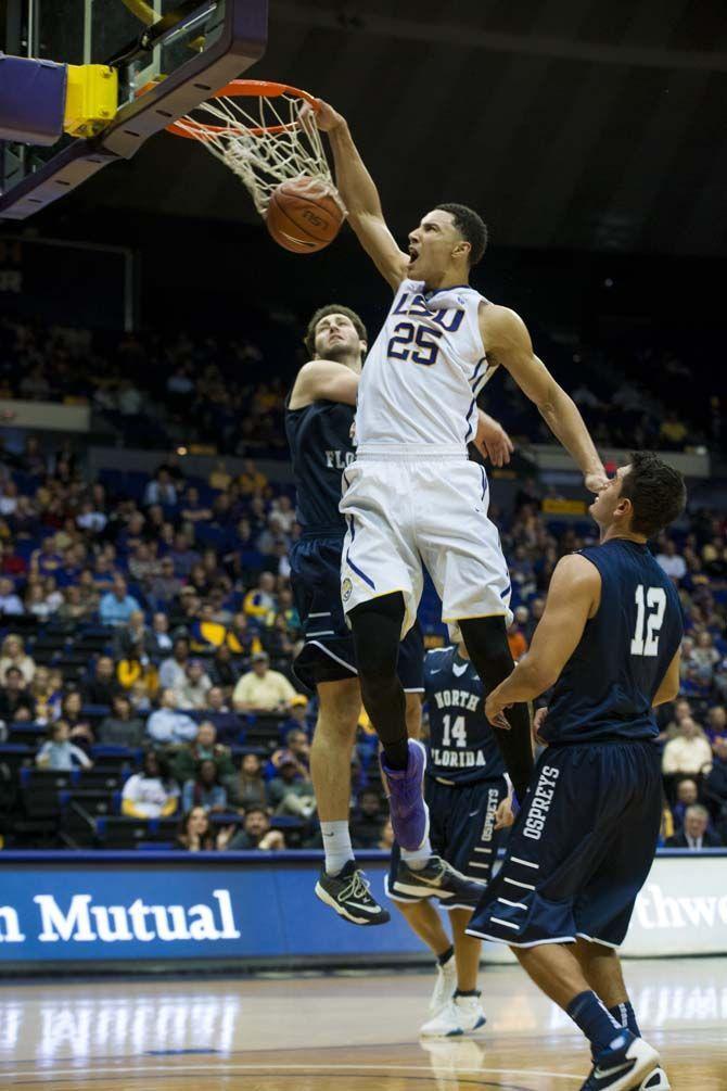 LSU freshman forward Ben Simmons (25) goes up for, one of many, slam dunks against North Florida during the Tigers' 119-108 win against the North Florida Ospreys on Wednesday Dec. 2, 2015, at the PMAC.