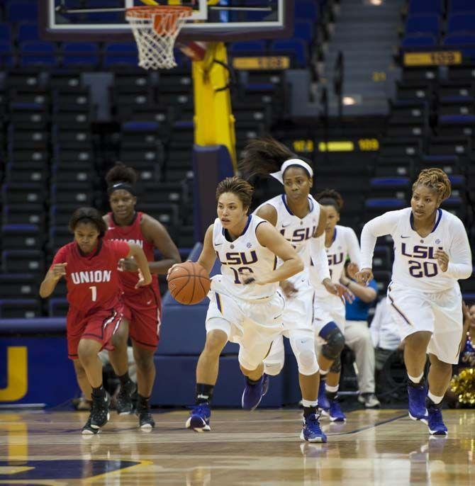 LSU junior guard Rina Hill (13) makes her way down the court towards the Union basket during their 88-57 win against Union on Wednesday Nov. 4, 2015, in the LSU Pete Maravich Assembly Center.