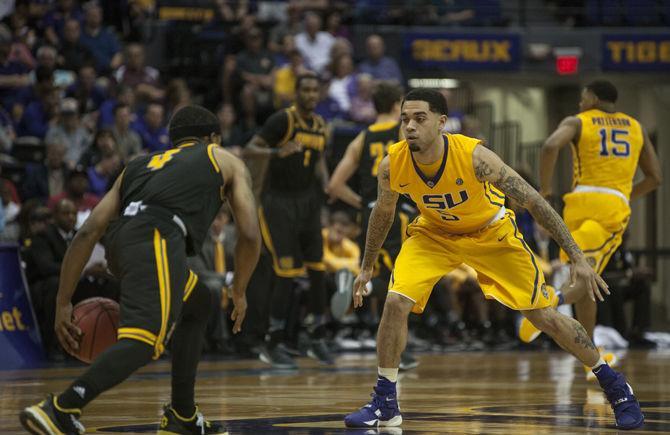 LSU senior guard Josh Gray (5) defends during the Tigers' 91-69 victory against Kennesaw State University on Monday, Nov. 16, 2015 in the PMAC.