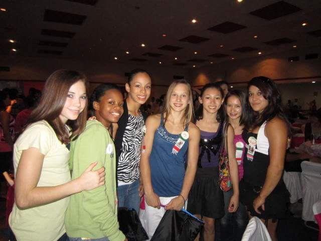 Senior&#160;all-arounder&#160;Jessica Savona (far right) and freshman all-arounder&#160;Sarah Finnegan (second from right) pose during the&#160;Pan-American Games in&#160;Guadalajara, Mexico, in Sept. 2010.&#160;