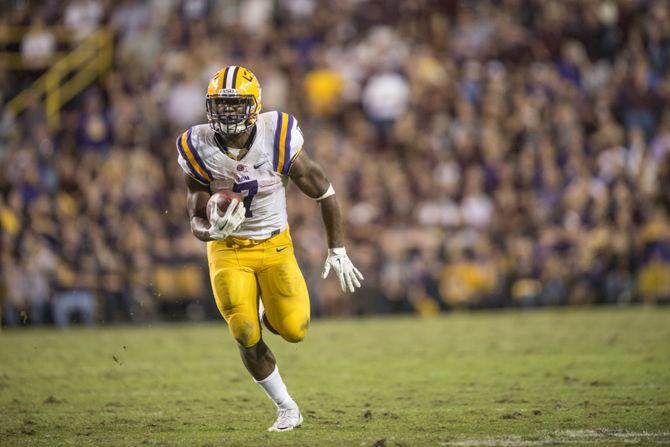 LSU sophomore running back Leonard Fournette (7) rushes during the Tigers' 19-7 victory against Texas A&amp;M University on Saturday, Nov. 28, 2015 in Tiger Stadium.