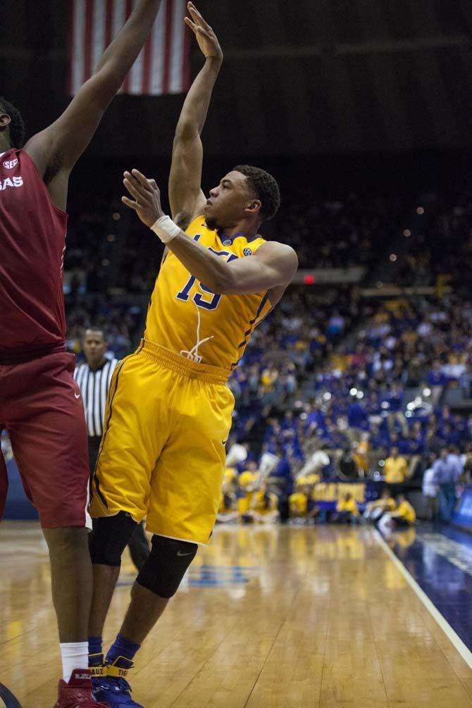 LSU sophomore guard Jayln Patterson (15) shoots a 3-pointer over an Arkansas defender during LSU's 76-74 win against the Arkansas on Jan. 16 at the PMAC.