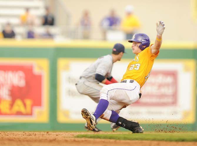 LSU sophomore outfielder Jake Fraley slides to second base Sunday, March 15, 2015 during the Tigers' 18-6 victory against Ole Miss at Alex Box Stadium.