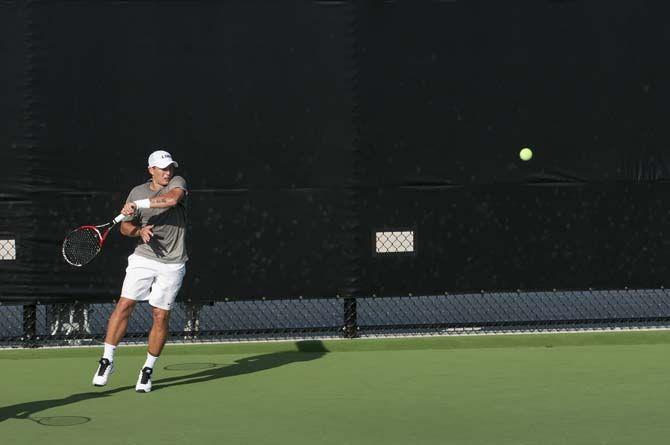 Sophomore, Gabor Csonka, strikes the ball at the Tennis Invitational on Thursday, Nov. 05, 2015, at the new Tennis Complex on Gourrier Ave.