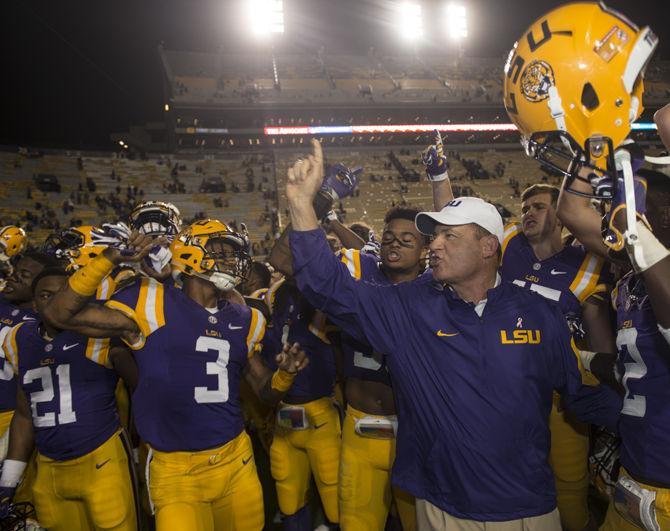 LSU head coach Les Miles sings LSU&#8217;s alma mater during the Tigers&#8217; 44-22 victory against Eastern Michigan on Saturday, Oct. 03, 2015 in Tiger Stadium.