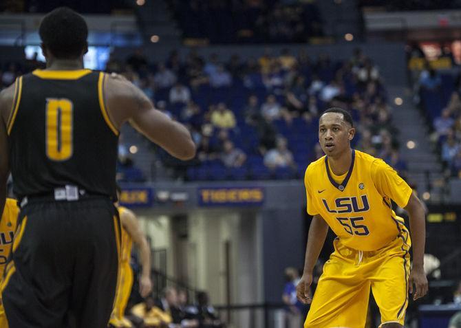 LSU junior guard Tim Quarterman (55) stares at his opponent during the Tigers' 91-69 victory against Kennesaw State University on Monday, Nov. 16, 2015 in the PMAC.