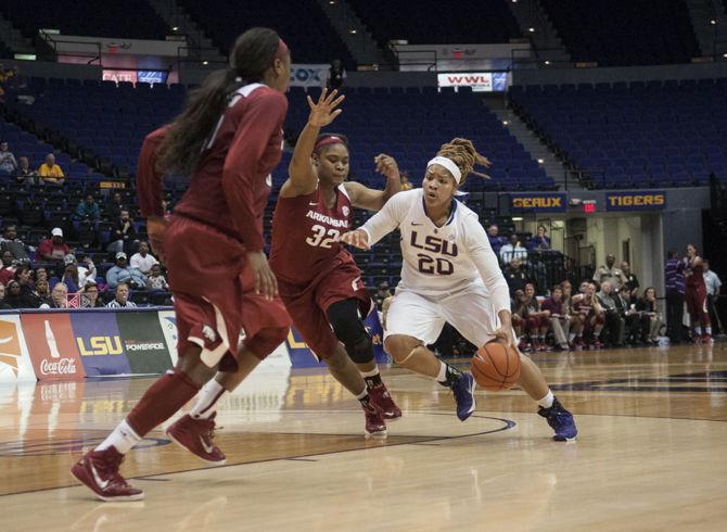 LSU junior forward Alexis Hyder (20) dribbles past her opponents Thursday, Jan. 21, 2016, during the Lady Tigers' 48-44 loss against Arkansas in the PMAC.