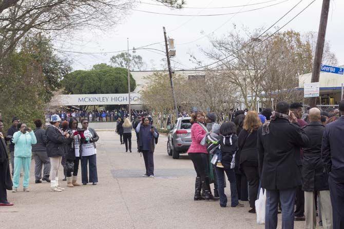 Fans and local supporters line up outside to see President Barack Obama addresses the public on Thursday, January 14, 2016 at Mckinley High School in Baton Rouge.