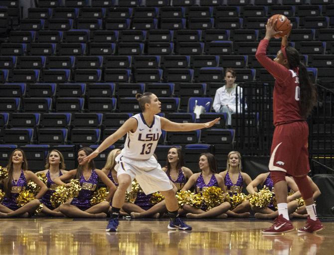 LSU junior guard Rina Hill (13) defends her opponent Thursday, Jan. 21, 2016, during the Lady Tigers' 48-44 loss against Arkansas in the PMAC.