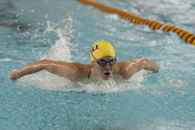 LSU senior swimmer Megan Cox swims in the Womens' 200 yard butterfly event during the LSU Swimming and Diving meet against Tulane on Oct. 9, 2015, in the Natatorium.