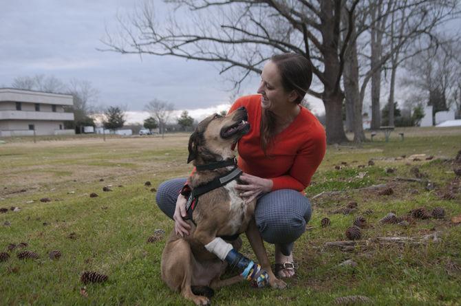 Niki Marie Hansen, a LSU graduate student, and her dog, Bob, on Monday, Jan. 25, 2016.