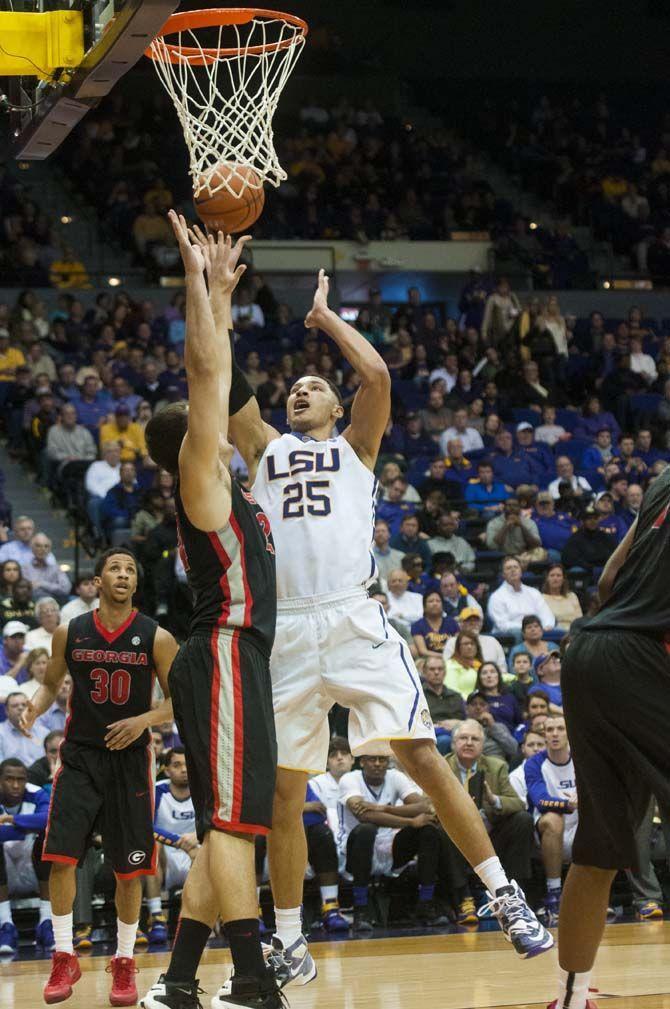 LSU freshman forward Ben Simmons (25) goes up for a score contested by the Georgia defense during the LSU 89-85 win against Georgia on Tuesday Jan. 26, 2016, in the PMAC.