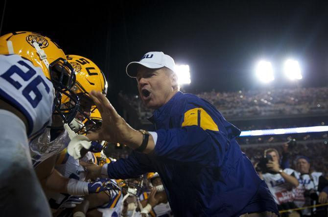 LSU head coach Les Miles emerges from the locker room on Saturday, Nov. 14, 2015, during the Tigers' 31-14 defeat against University of Arkansas in Tiger Stadium.