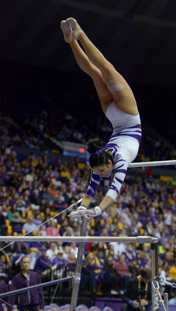 LSU sophomore Shae Zamardi flips during a bars routine on Friday, Jan. 23, 2015, during the Lady Tiger's 197-192 victory against Missouri in the Pete Maravich Assembly Center.