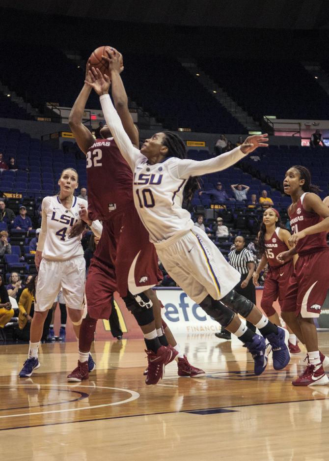 LSU junior guard Jasmine Rhodes (10) leaps for the ball Thursday, Jan. 21, 2016, during the Lady Tigers' 48-44 loss against Arkansas in the PMAC.