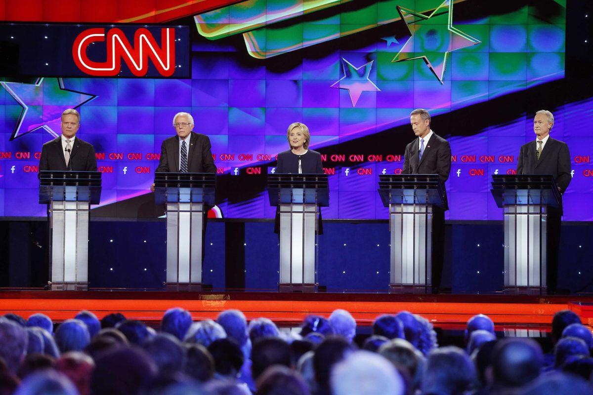 Democratic presidential candidates from left, former Virginia Sen. Jim Webb, Sen. Bernie Sanders, of Vermont, Hillary Rodham Clinton, former Maryland Gov. Martin O'Malley, and former Rhode Island Gov. Lincoln Chafee take the stage before the CNN Democratic presidential debate Tuesday, Oct. 13, 2015, in Las Vegas.