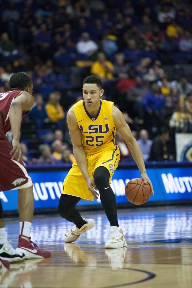 LSU freshman forward Ben Simmons (25) dribbles the ball around the Arkansas defense during LSU's mens basketball 76-74 win aginst the Arkansas Razorbacks on Saturday Jan. 16, 2016, in the PMAC on LSU's campus.